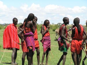 Amboseli Cultural Tours: An Authentic Maasai Experience In The Heart Of Kenya • Naicef  Kenya cultural safaris, Masai African culture, Cultural tour packages, Amboseli Maasai Culture Tour Kenya, Amboseli Maasai village experience